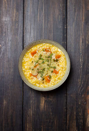 Risotto with pumpkin, cheese and thyme. Vegetarian food. healthy eatingの写真素材