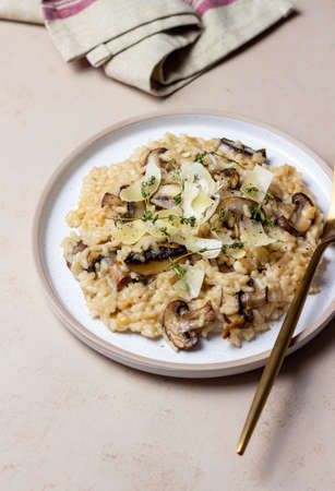 Risotto with mushrooms, cheese and thyme. Vegetarian food. Italian foodの写真素材