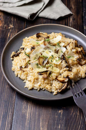 Risotto with mushrooms, cheese and thyme. Vegetarian food. Italian foodの写真素材