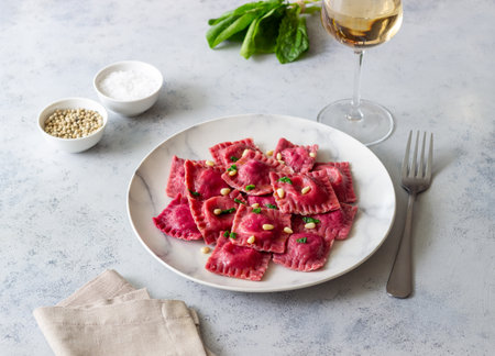 Beet ravioli with ricotta cheese, spinach and nuts. Healthy eating. Vegetarian food. Italian cuisineの写真素材