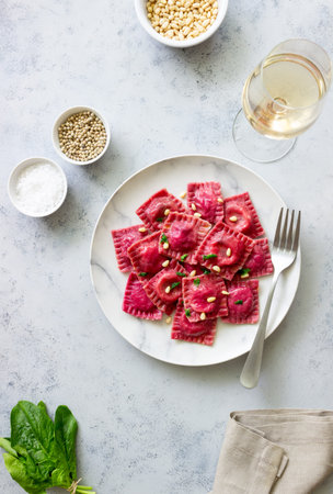 Beet ravioli with ricotta cheese, spinach and nuts. Healthy eating. Vegetarian food. Italian cuisineの写真素材