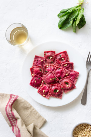 Beet ravioli with ricotta cheese, spinach and nuts. Healthy eating. Vegetarian food. Italian cuisineの写真素材
