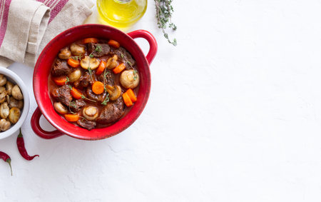 Burgundy beef stewed with potatoes, carrots and champignons French cuisine