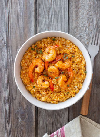 Risotto with shrimps, tomatoes and thyme. Italian foodの写真素材