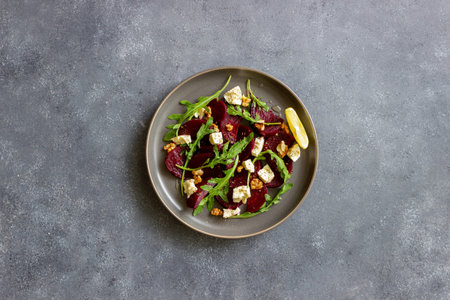 Beetroot salad with cheese, arugula, nuts and honey. Healthy eating. Vegetable food