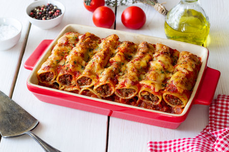 Cannelloni with meat, cheese, tomatoes and thyme. Italian foodの写真素材