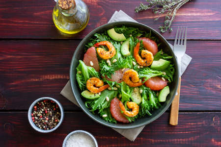 Salad with shrimp, grapefruit, avocado and nuts. healthy eatingの写真素材