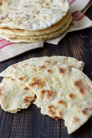 Pita bread on a wooden background. national cuisine. healthy eating. Vegetarian food