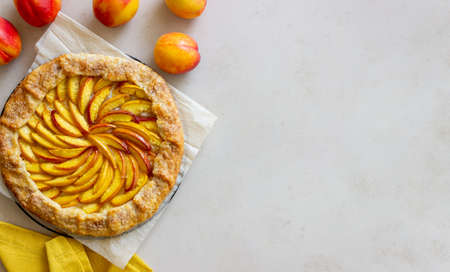 Galette or open pie with peaches. Baking. Vegetable foodの写真素材