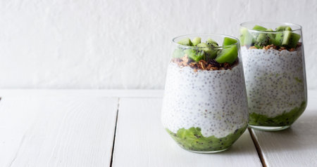 Chia pudding with kiwi and granola. healthy eating. Vegetarian food.の写真素材