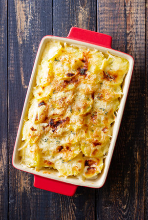 Potato casserole with cheese and cream. Vegetarian food. french food. Gratin dauphinoisの写真素材