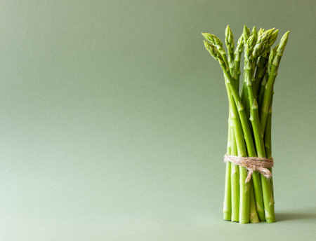 Asparagus on a green background. healthy eating. Vegetarian food. Dietの写真素材