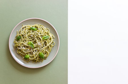 Spaghetti pasta with pesto, basil and Parmesan cheese. Italian food. Vegetarian foodの写真素材