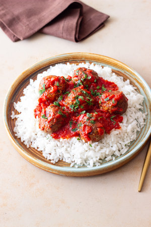 Rice with meatballs in tomato sauce. Italian foodの写真素材
