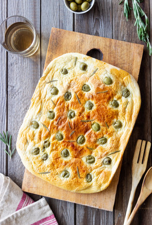 Focaccia with olives and rosemary. Italian food. Vegetarian foodの写真素材