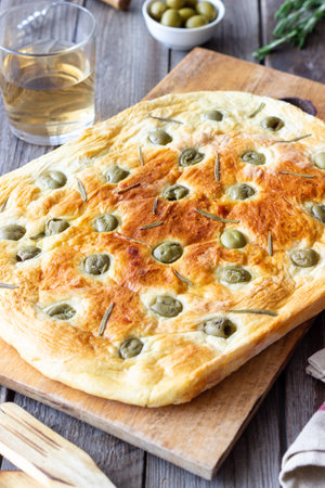 Focaccia with olives and rosemary. Italian food. Vegetarian foodの写真素材
