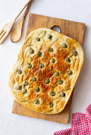 Focaccia with olives and rosemary. Italian food. Vegetarian foodの写真素材