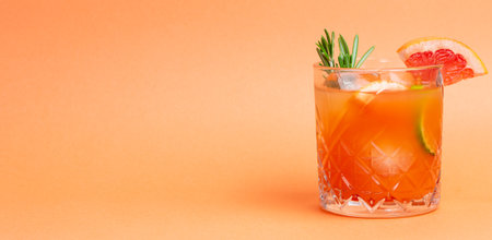 Paloma cocktail with grapefruit, lime and rosemary. Grapefruit juice. Alcohol. Tequilaの写真素材