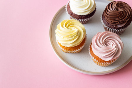 Cupcakes on a pink background. Dessert. Cooking. Baking. Vegetarian food