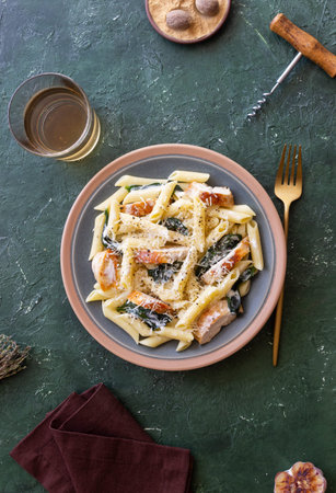 Pasta alfredo with chicken, spinach and cheese. Italian foodの写真素材