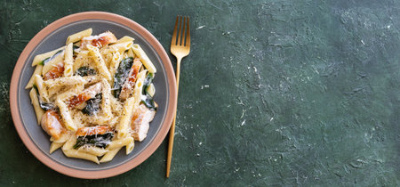 Pasta alfredo with chicken, spinach and cheese. Italian foodの写真素材