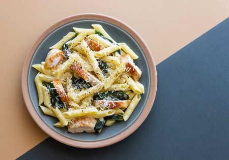 Pasta alfredo with chicken, spinach and cheese. Italian foodの写真素材