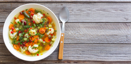 Vegetable soup with cauliflower, beans, carrots and zucchini. Healthy eating. Vegetarian foodの写真素材