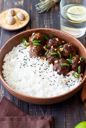 Beef meatballs in teriyaki sauce with rice. Asian foodの写真素材