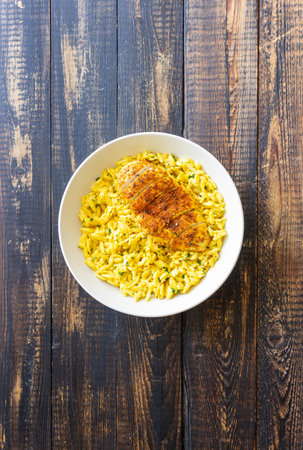 Orzo pasta with roasted chicken breast and curry sauce. Recipe. Healthy eatingの写真素材