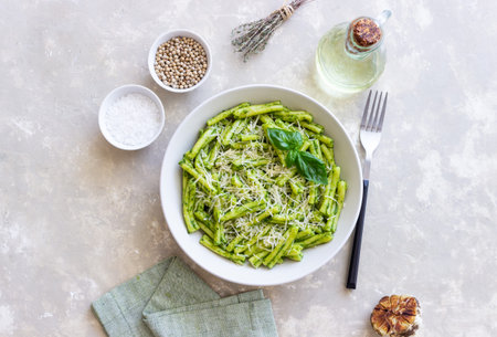 Pasta casarecce with pesto sauce, basil and cheese. Italian cuisine. Vegetarian foodの写真素材