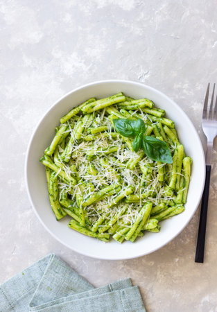 Pasta casarecce with pesto sauce, basil and cheese. Italian cuisine. Vegetarian foodの写真素材