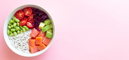 Poke bowl with rice, salmon, avocado, red cabbage, edamame and tomatoes. Healthy food. Diet