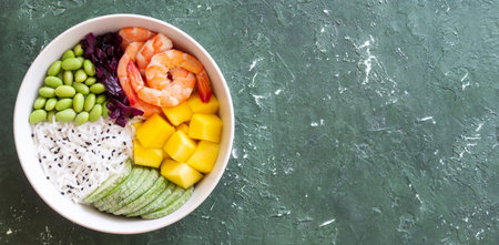 Hawaiian poke bowl with rice, shrimp, red cabbage, radish, edamame, and mango. Healthy eating. Diet
