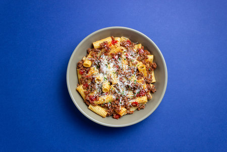 Pasta with bolognese sauce and cheese. Italian cuisine. Traditional recipeの写真素材