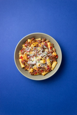 Pasta with bolognese sauce and cheese. Italian cuisine. Traditional recipeの写真素材