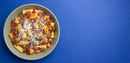 Pasta with bolognese sauce and cheese. Italian cuisine. Traditional recipeの写真素材