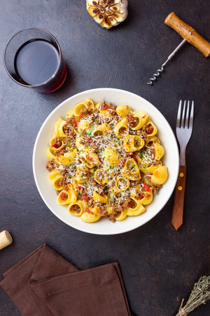 Pasta with bolognese sauce and cheese. Italian cuisine. Traditional recipeの写真素材