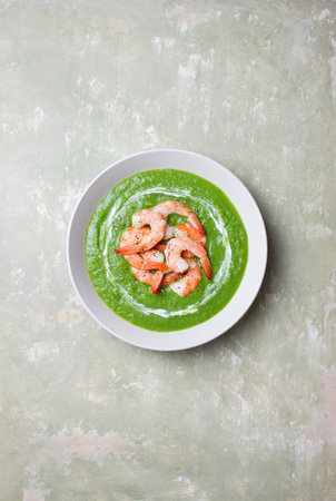 Green broccoli soup with shrimp. Vegetarian food. Healthy eatingの写真素材