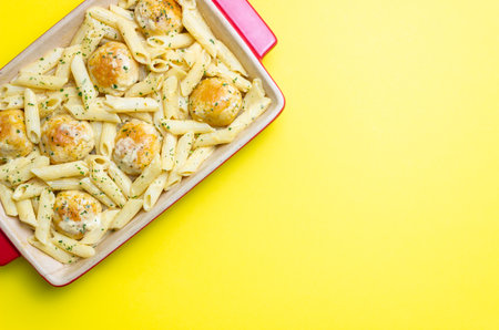 Pasta with chicken meatballs in a creamy sauce. Italian cuisine. Recipeの写真素材