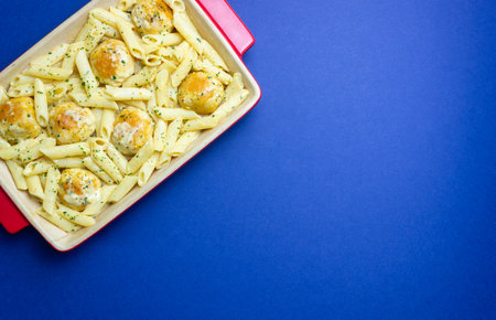 Pasta with chicken meatballs in a creamy sauce. Italian cuisine. Recipeの写真素材