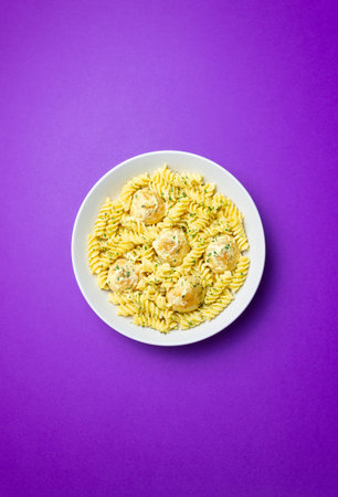 Pasta with chicken meatballs in a creamy sauce. Italian cuisine. Recipeの写真素材