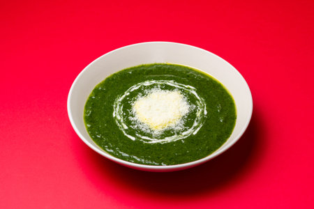 Green spinach soup with Parmesan cheese. Healthy eating. Vegetarian foodの写真素材