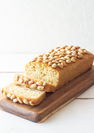 Loaf cake with peanut butter and nuts. Baked. Vegetarian.