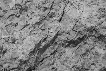 Dark stone or rock texture background. Wall design texture