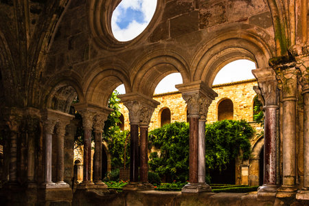 Carcassonne, France - 2019. Fontfroide Abbey monastery in France.Gothic walls and arches.