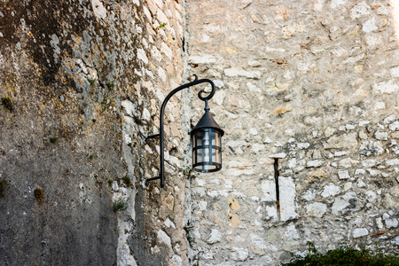 Old streetlight in the medieval village of Eze, France.の写真素材