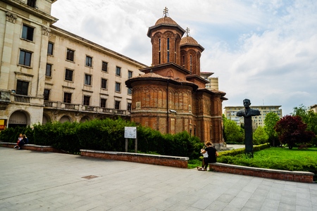 Bucharest, Romania - 2019. Woman painting the Kretzulescu Church (Biserica Kretzulescu) in Bucharest, Romania.のeditorial素材