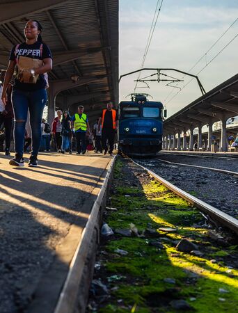 Bucharest, Romania - 2019. People getting of the train Bucharest North Railway Station (Gara de Nord) in Bucharest, Romania.のeditorial素材