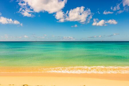Idyllic beach in Barbados Island, Caribbean. Beach line, white sand, clear turquoise water.の写真素材