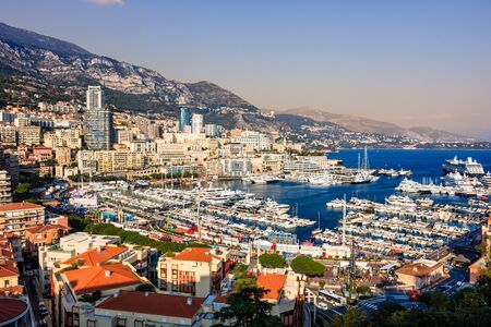Monte Carlo, Monaco â 2019. Monte Carlo city panorama and harbor with yachts and sail boats.のeditorial素材